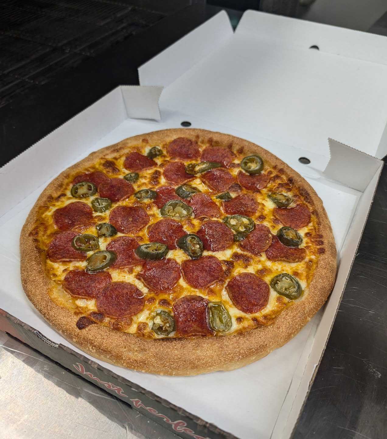 Doner G's Cheesy Pizza With Fresh Toppings on it